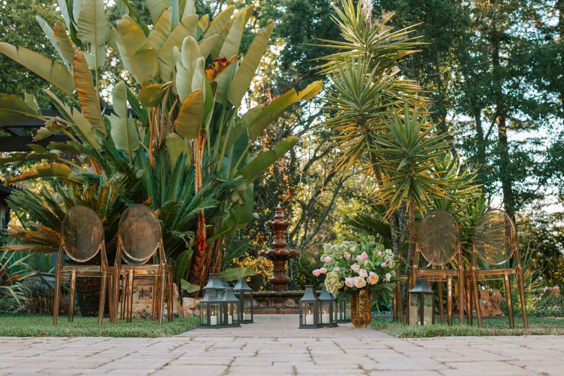 Tropical outdoor garden wedding ceremony setup with fountain in Miami
