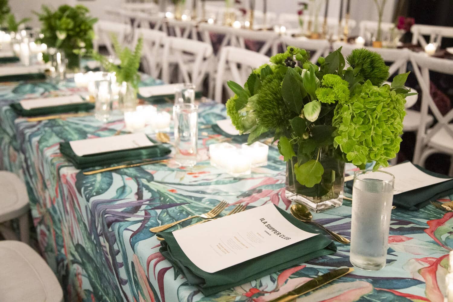Elegant tropical wedding reception table setting with greenery in Miami