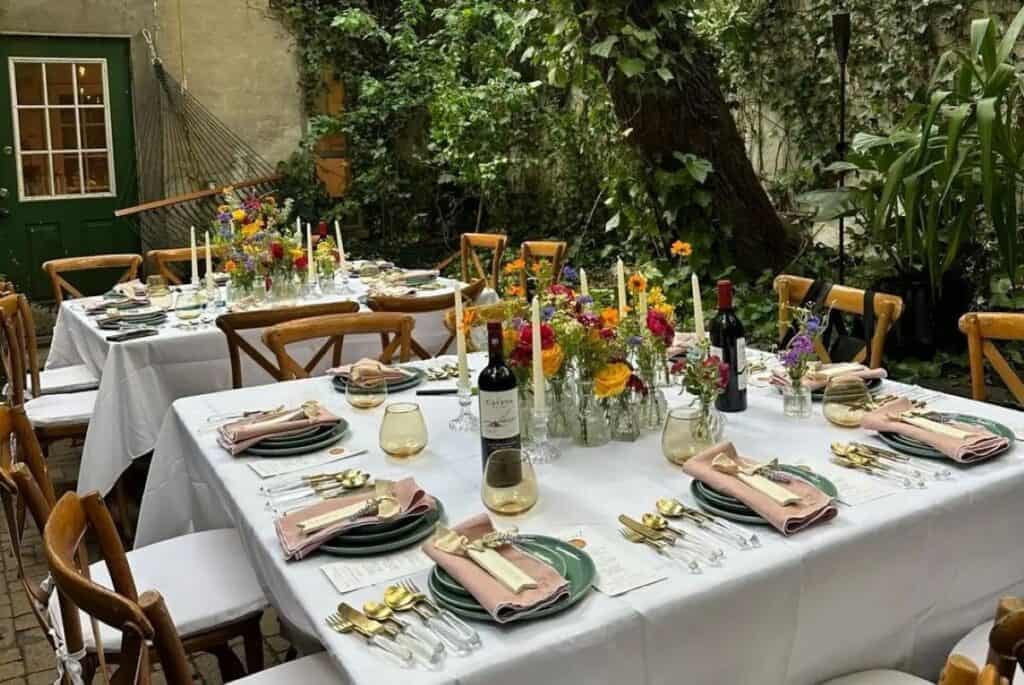 an outdoor dinner party with decor and food