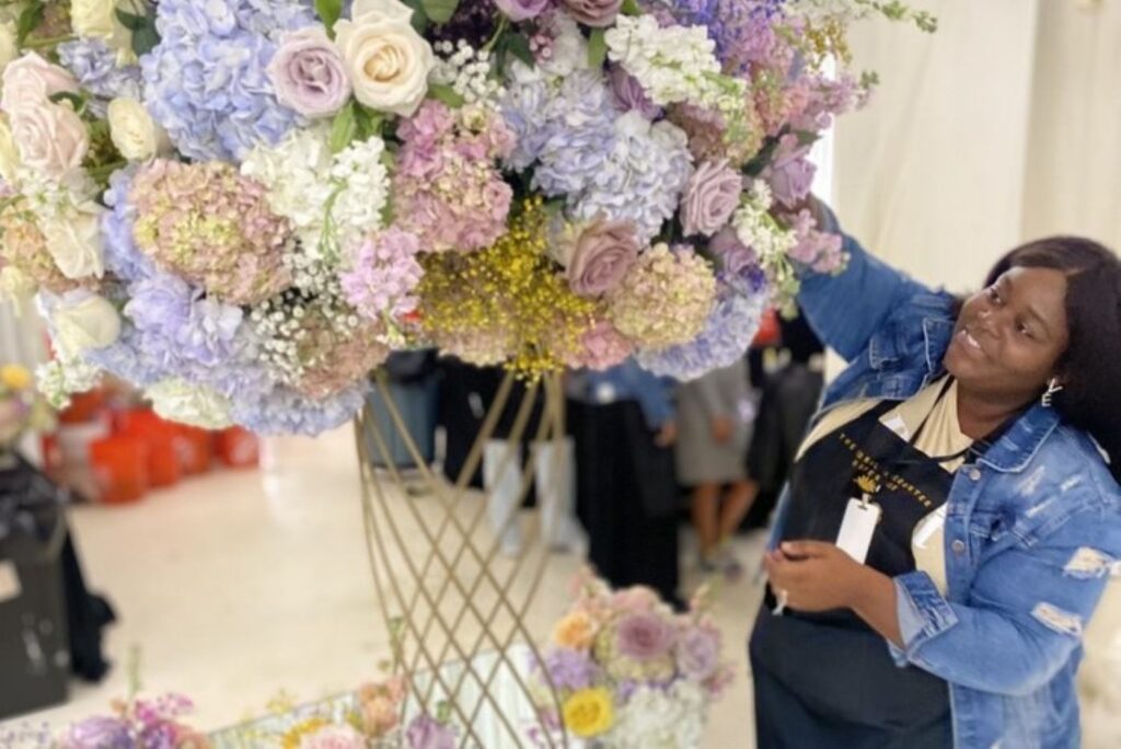 michelle with a huge bouquet of flowers