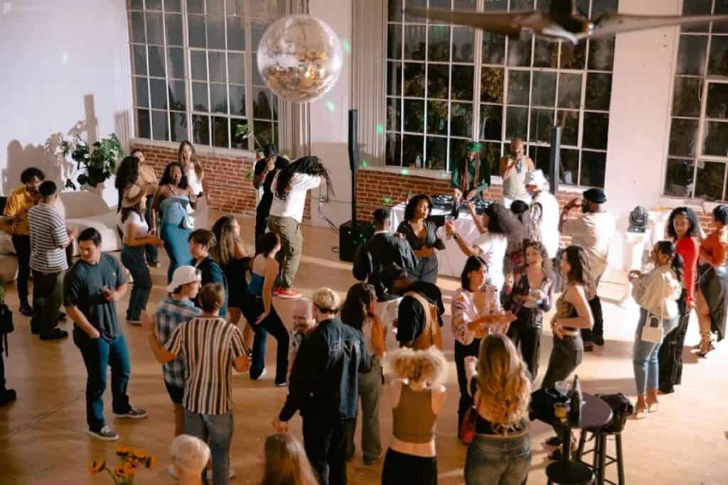 people dancing at a birthday party